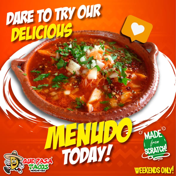 Que Pasa Tacos' Menudo, a rich red soup with cilantro and onions in a rustic bowl.