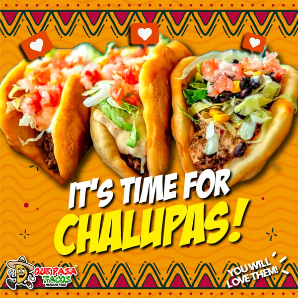 Three Que Pasa Tacos chalupas with meat, lettuce, tomatoes, and cheese, on an orange background.