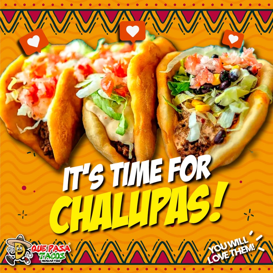 Three Que Pasa Tacos chalupas with meat, lettuce, tomatoes, and cheese, on an orange background.